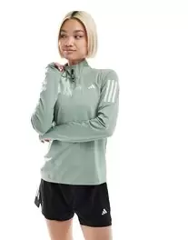 Adidas Running Own The Run 1/4 zip top in silver green kínálat, 38 Ft a ASOS -ben