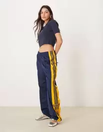 Adidas Originals Adibreak track pants in navy and yellow kínálat, 65 Ft a ASOS -ben