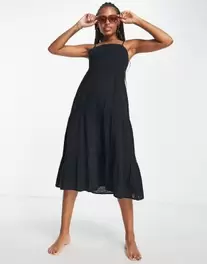 IIsla & Bird tiered maxi beach summer dress in black kínálat, 30 Ft a ASOS -ben